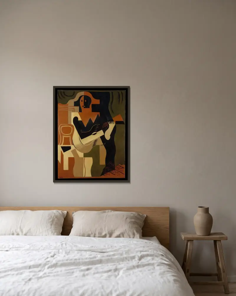 Harlekin sittande med gitarr av Juan Gris inramad på en vägg