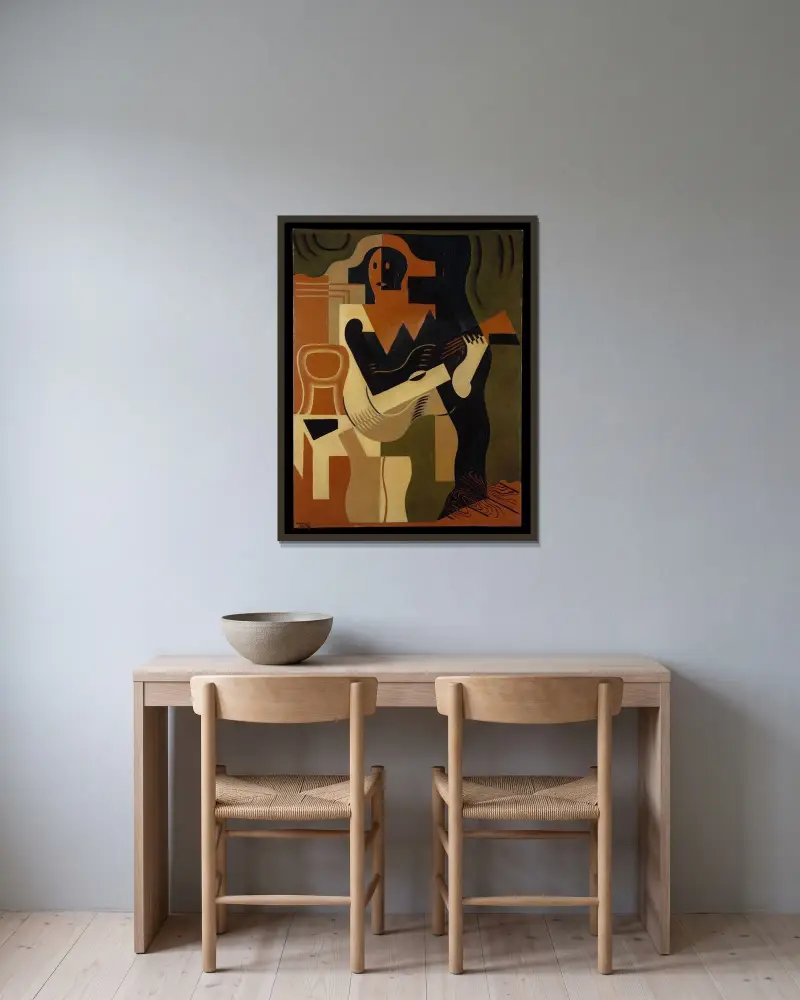 Harlekin sittande med gitarr av Juan Gris inramad på en vägg