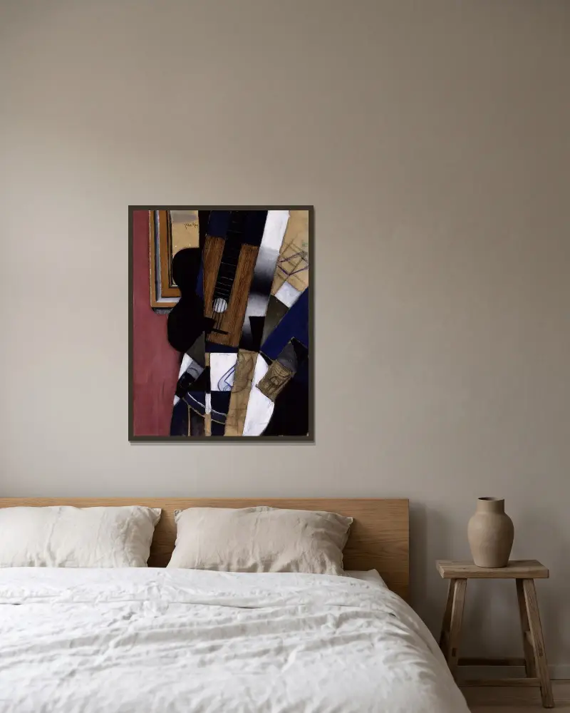 Gitarr och pipa av Juan Gris inramad på en vägg