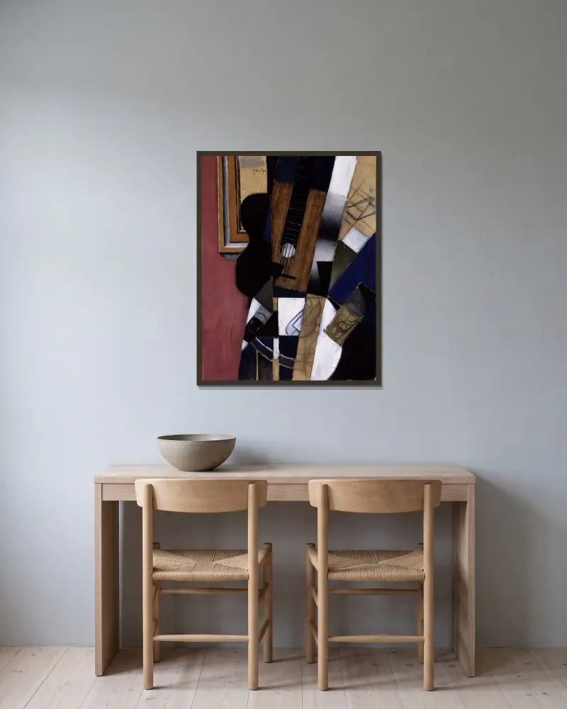 Gitarr och pipa av Juan Gris inramad på en vägg