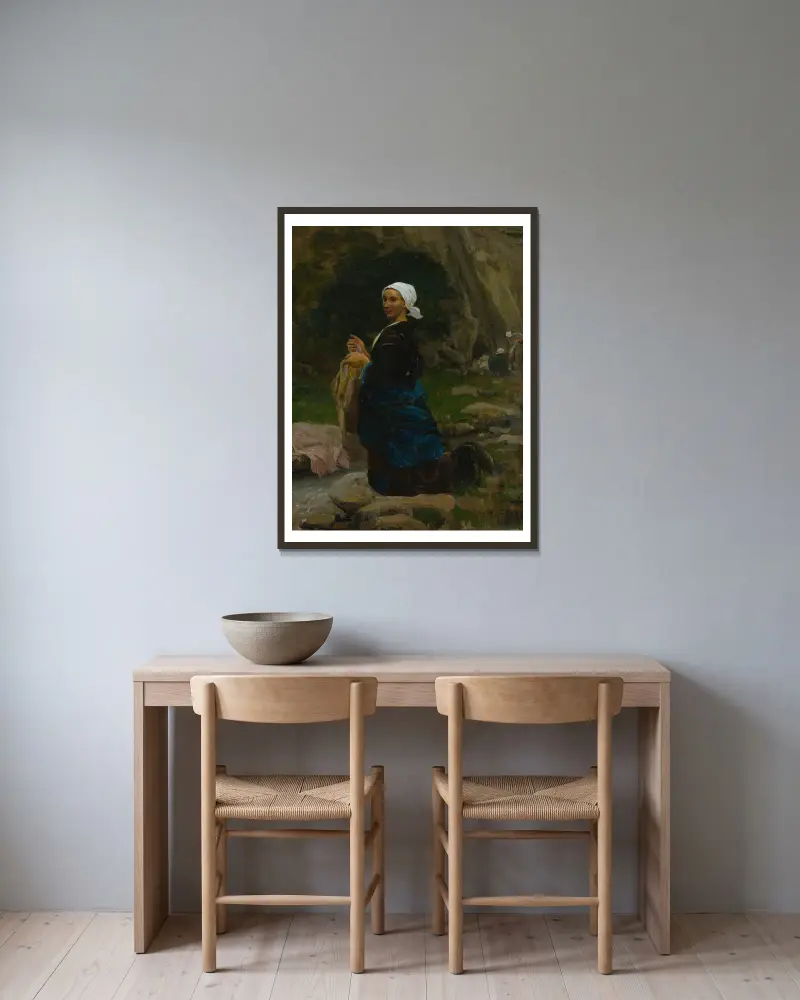 Brittany Washerwoman av Jules Breton inramad på en vägg