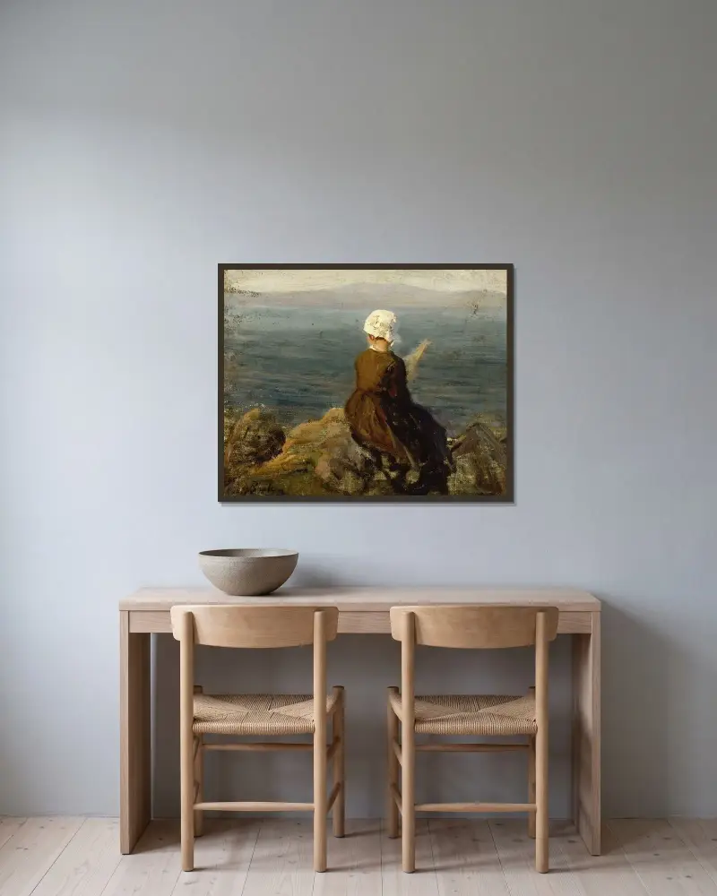 Spinnande kvinna på klipporna vid Douarnenez av Jules Breton inramad på en vägg