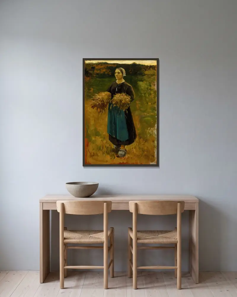 Axflickan av Jules Breton inramad på en vägg
