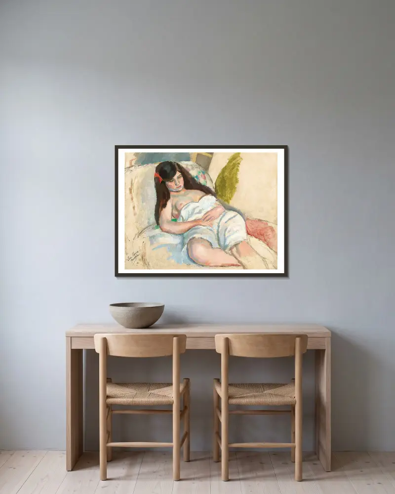Femme Étendue av Jules Pascin inramad på en vägg