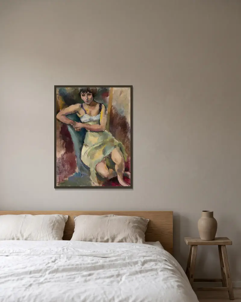 Sittande ung flicka av Jules Pascin inramad på en vägg