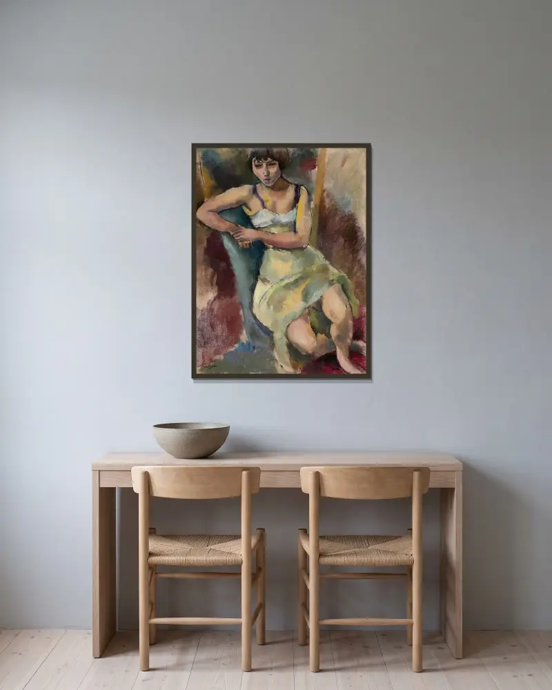 Sittande ung flicka av Jules Pascin inramad på en vägg