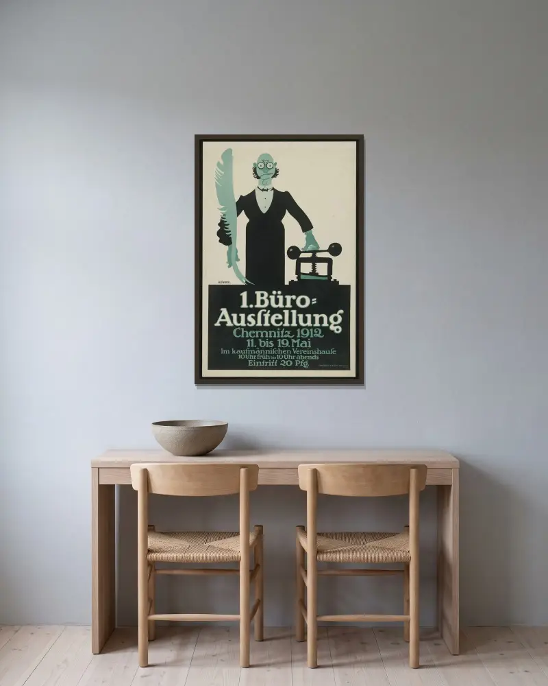 1. Kontorsutställning i Chemnitz av Julius Klinger inramad på en vägg