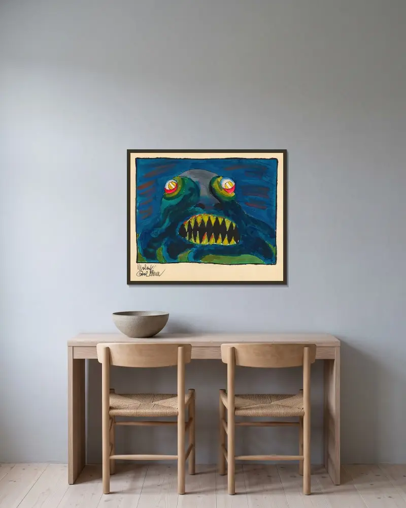 Moloch av Karl Wiener inramad på en vägg
