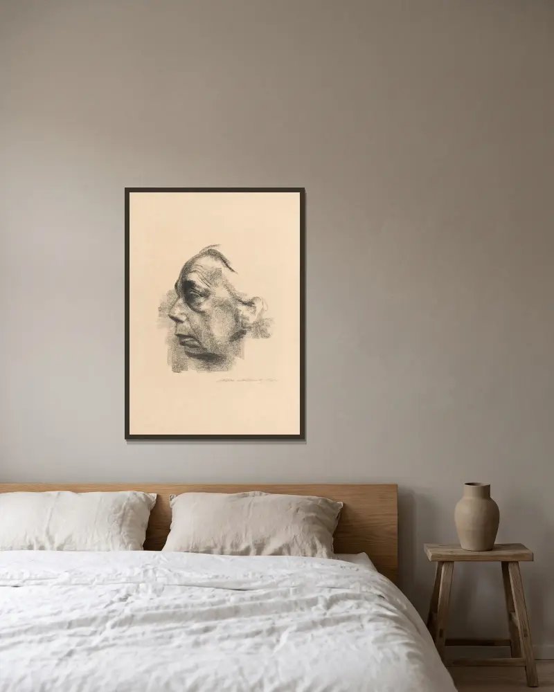 Selbstbildnis im profil av Käthe Kollwitz inramad på en vägg
