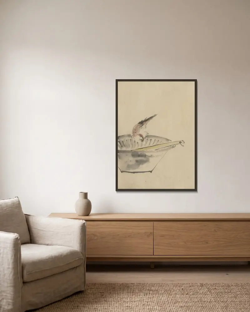 A bird perched on the edge of a bowl, with head cocked, looking at a utensil in the bowl av Katsushika Hokusai inramad på en vägg