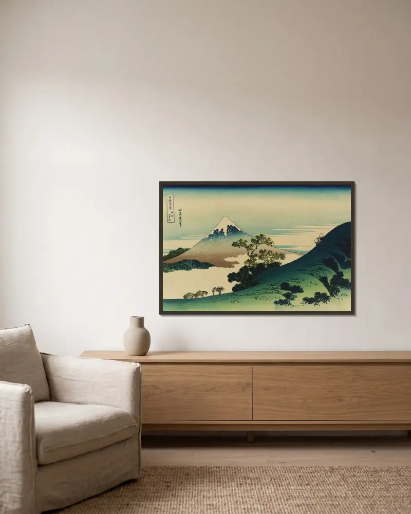 Kōshū inume-tōge av Katsushika Hokusai inramad på en vägg