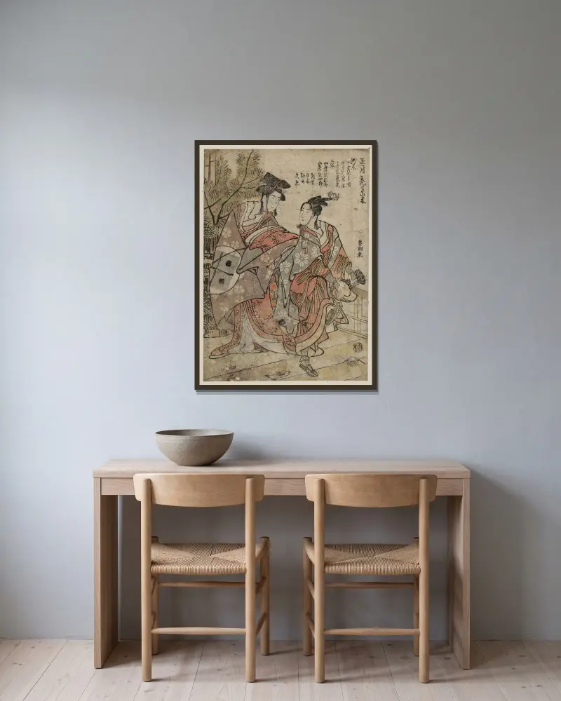 Nyårsmanzai med kamuro av Katsushika Hokusai inramad på en vägg
