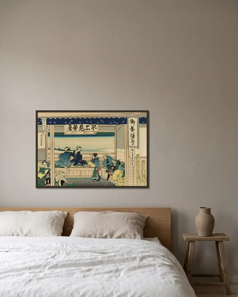 Tōkaidō Yoshida av Katsushika Hokusai inramad på en vägg