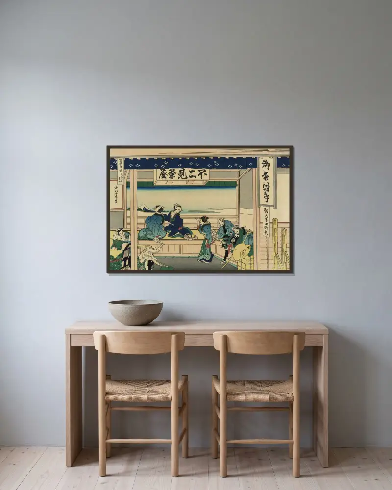 Tōkaidō Yoshida av Katsushika Hokusai inramad på en vägg
