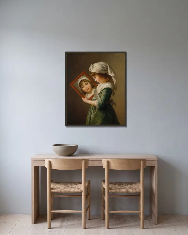 Julie Le Brun tittar i en spegel av Elisabeth Louise Vigée Le Brun inramad på en vägg