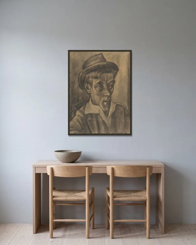 Byst av man med hatt av Leo Gestel inramad på en vägg