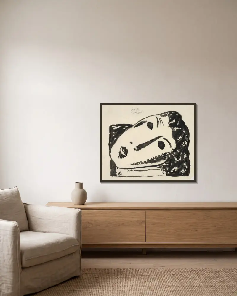 Liggande kvinnohuvud av Leo Gestel inramad på en vägg
