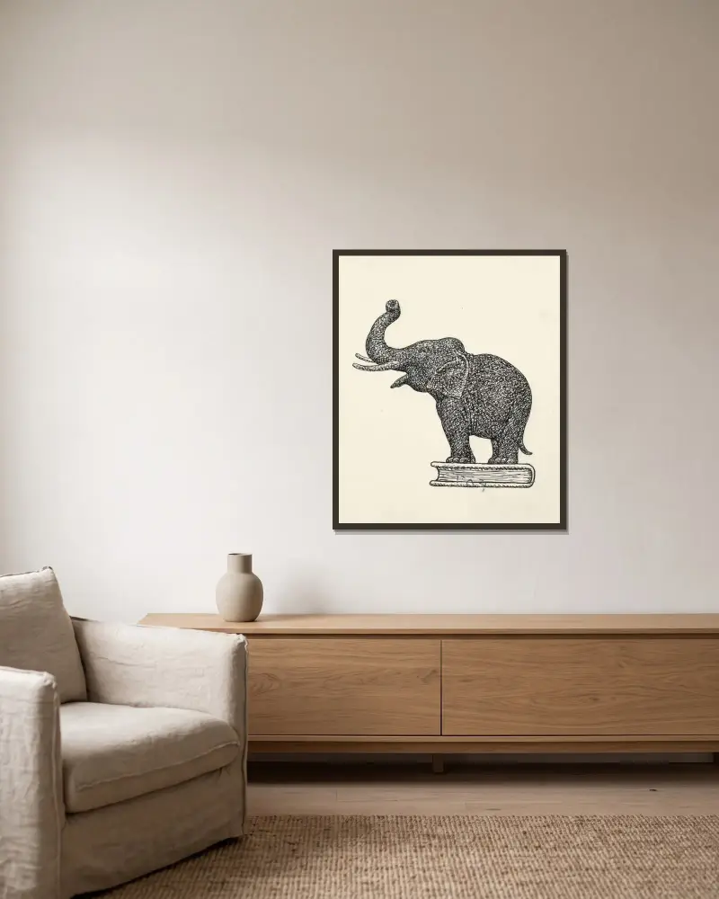 Elefant på bok av Leo Gestel inramad på en vägg