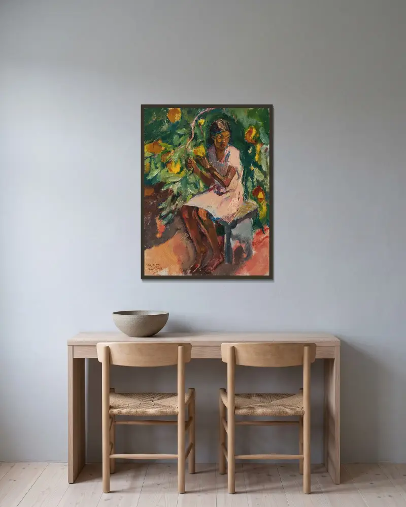 Julia plockar apelsiner av Leo Putz inramad på en vägg