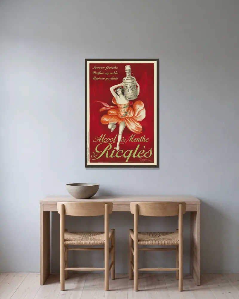 Alcool de menthe de Ricqlès av Leonetto Cappiello inramad på en vägg