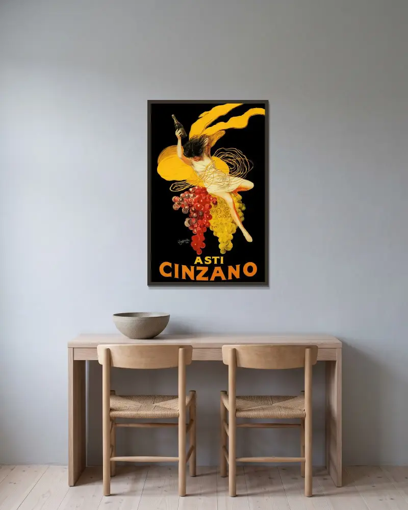 Asti Cinzano av Leonetto Cappiello inramad på en vägg