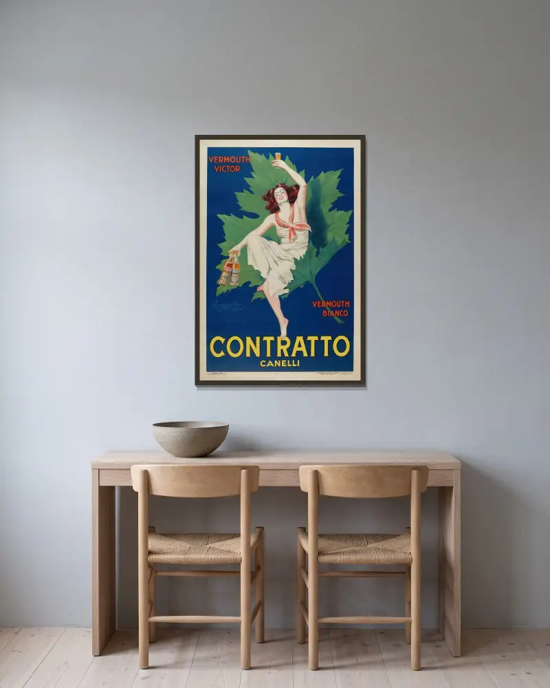 Contratto. Canelli av Leonetto Cappiello inramad på en vägg
