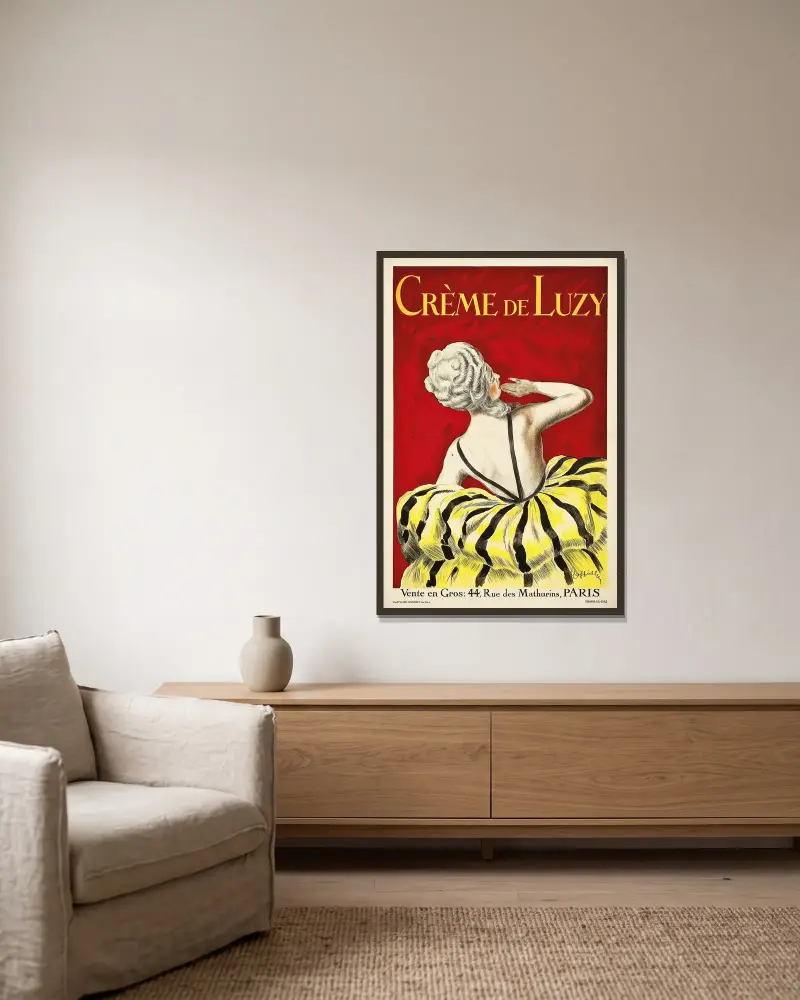 Crème De Luzy av Leonetto Cappiello inramad på en vägg