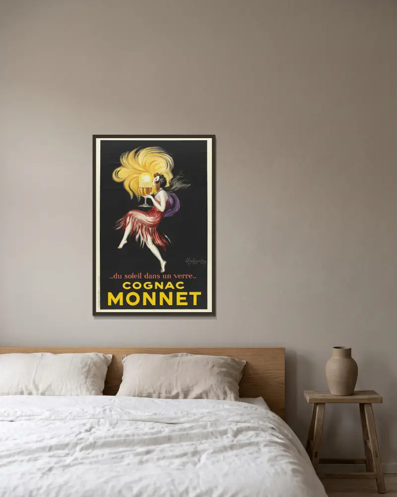 Du soleil dans un verre. Cognac Monnet av Leonetto Cappiello inramad på en vägg