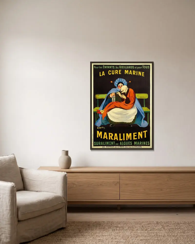 Maraliment av Leonetto Cappiello inramad på en vägg
