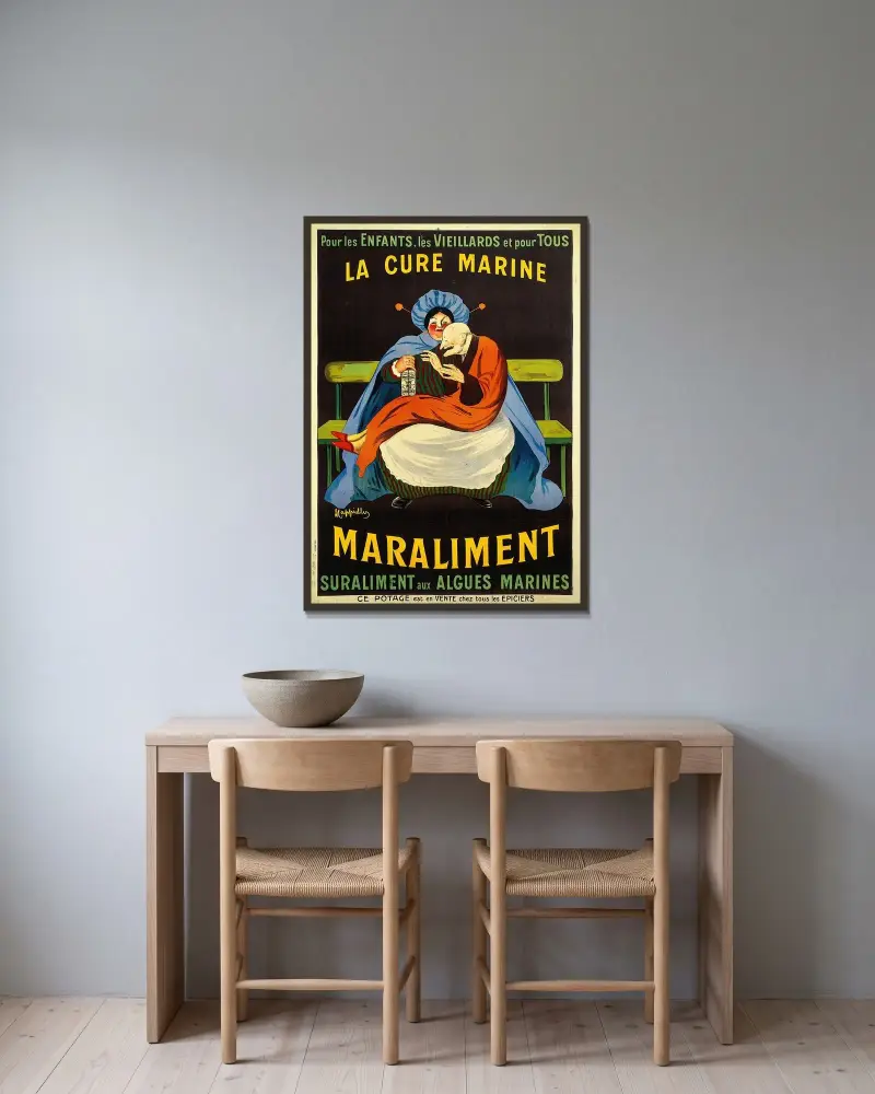 Maraliment av Leonetto Cappiello inramad på en vägg