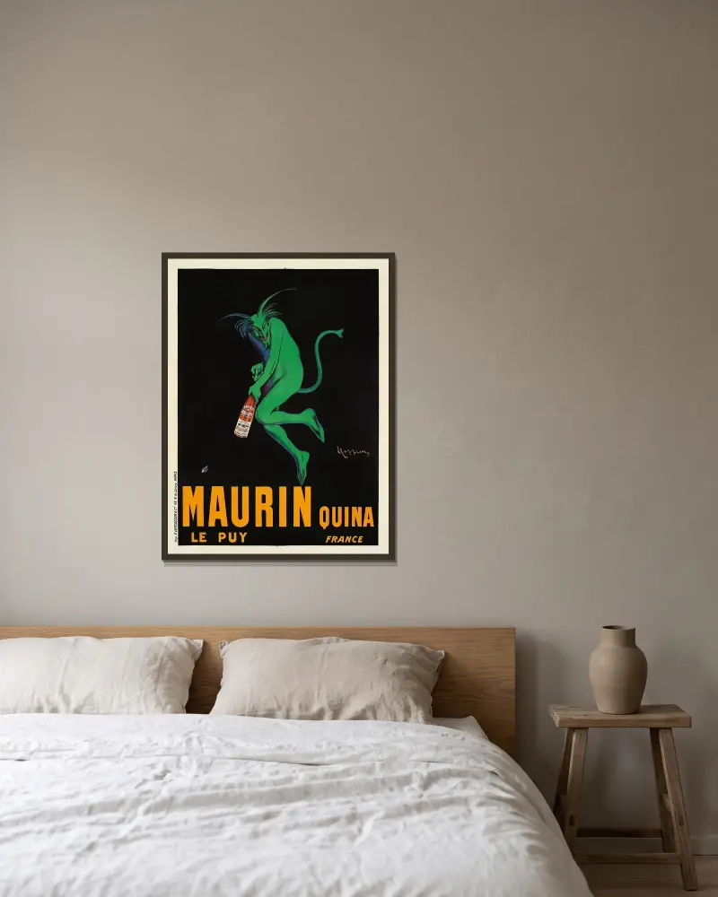 Maurin Quina av Leonetto Cappiello inramad på en vägg