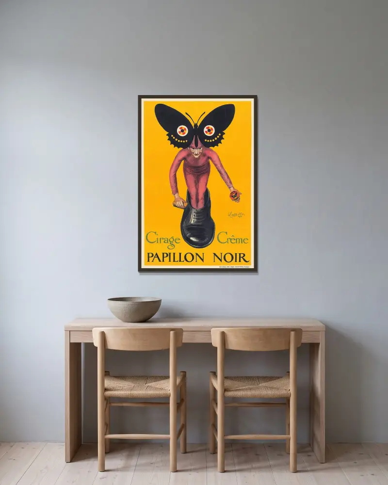 Papillon Noir av Leonetto Cappiello inramad på en vägg