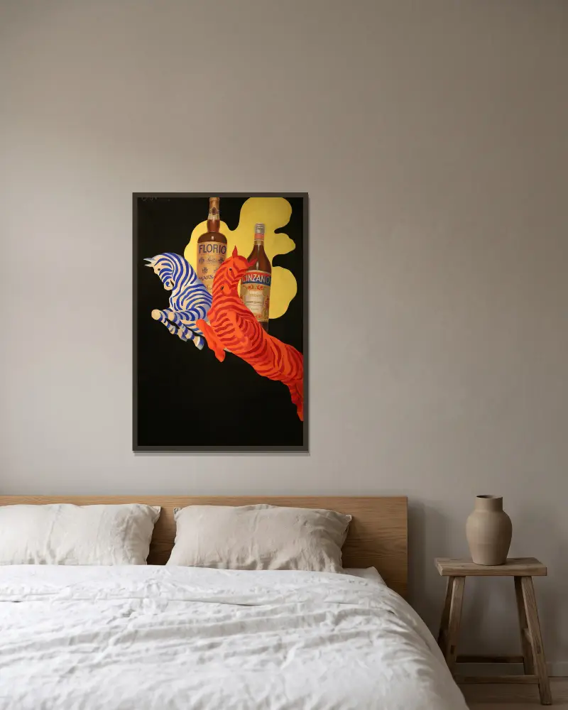 Poster Per Florio Cinzano av Leonetto Cappiello inramad på en vägg
