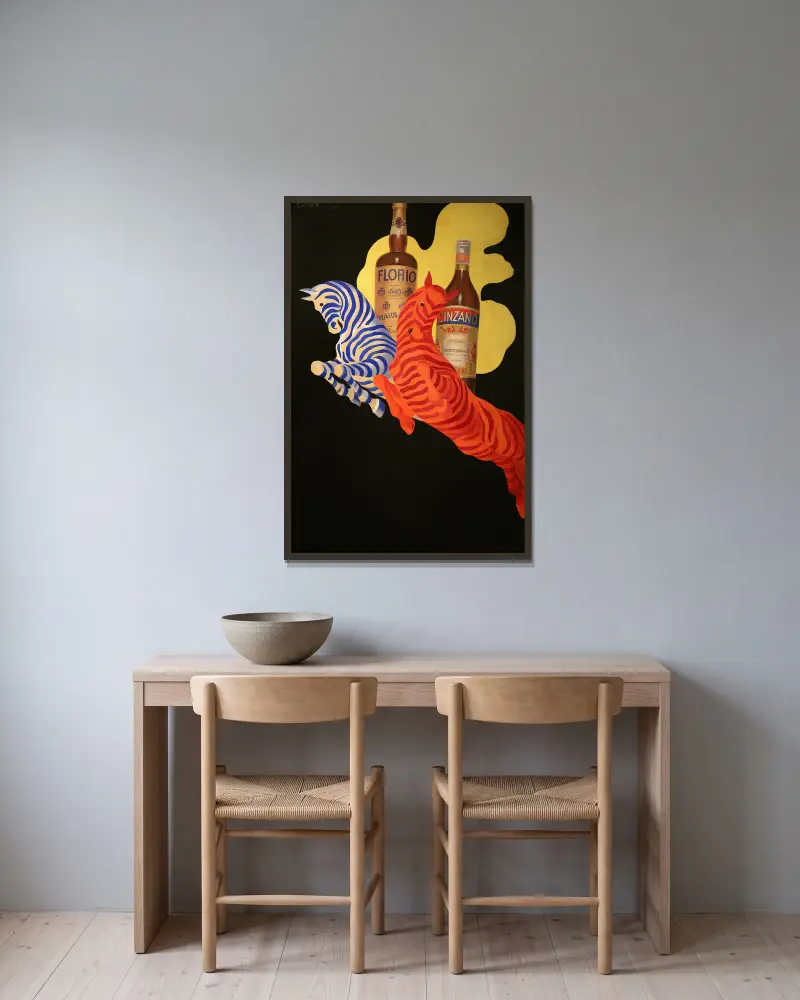 Poster Per Florio Cinzano av Leonetto Cappiello inramad på en vägg