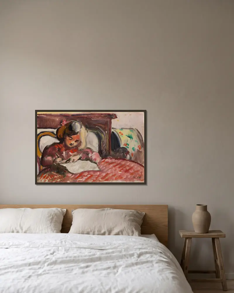 Skrivande barn av Louis Valtat inramad på en vägg