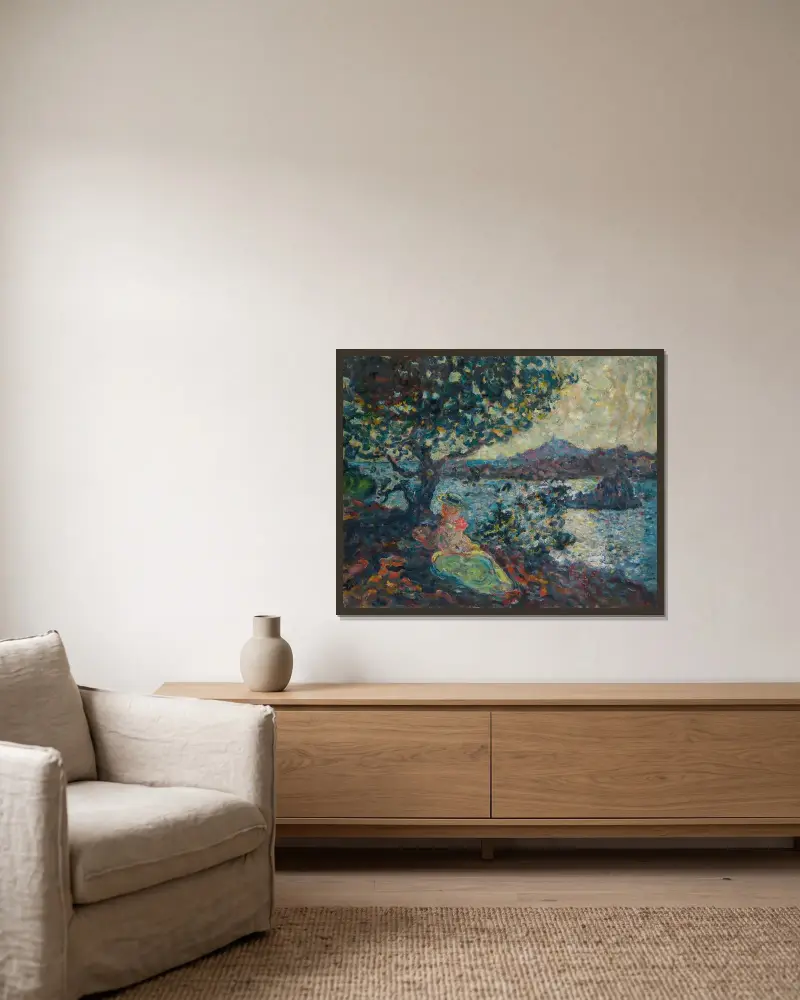 Kvinna sittande vid havet av Louis Valtat inramad på en vägg