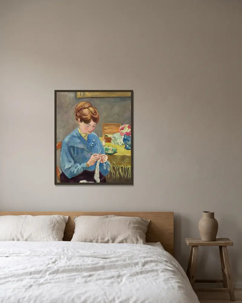 Kvinna som stickar av Louis Valtat inramad på en vägg