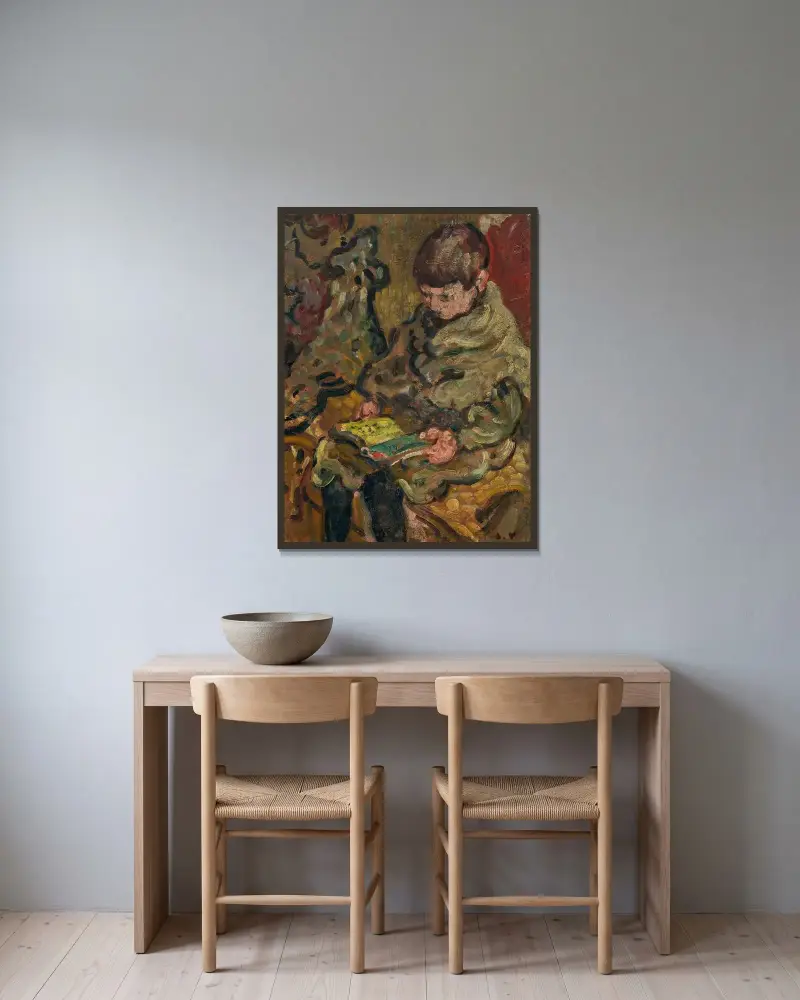 Läsande pojke av Louis Valtat inramad på en vägg