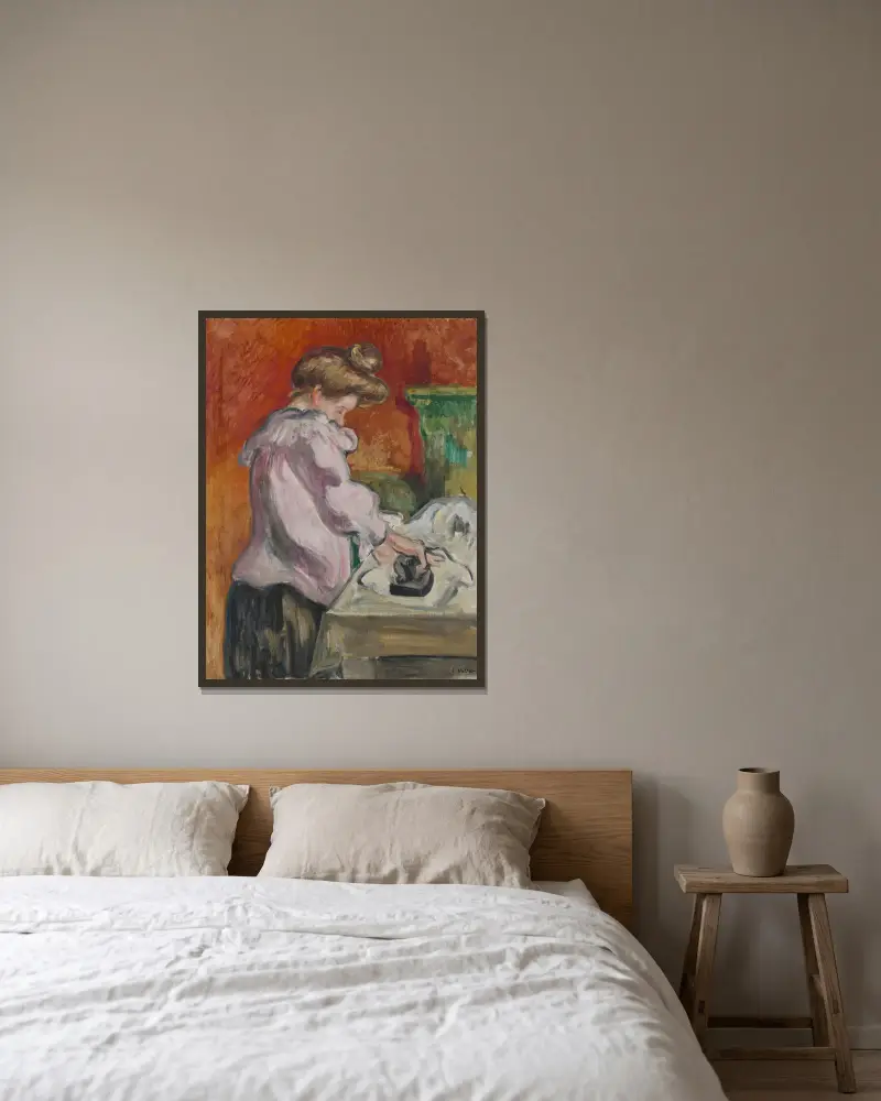 Die Büglerin von Louis Valtat gerahmt an einer Wand