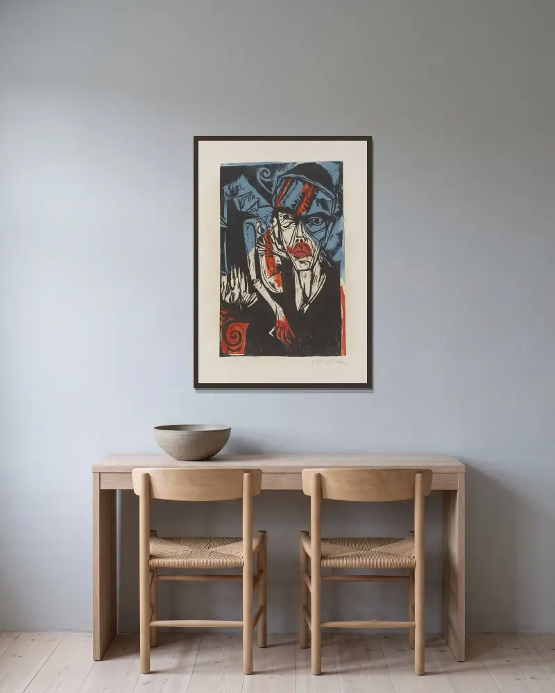 Hádky (Lásky trýzeň), Ernst Ludwig Kirchner v rámu na stěně