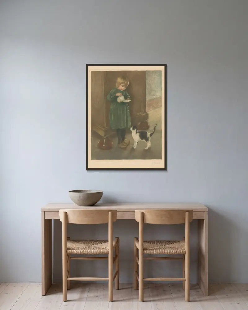 Girl feeding a cat av Hendrik Maarten Krabbé inramad på en vägg