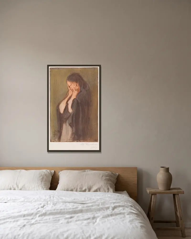Gråtande kvinna av Magnus Enckell inramad på en vägg