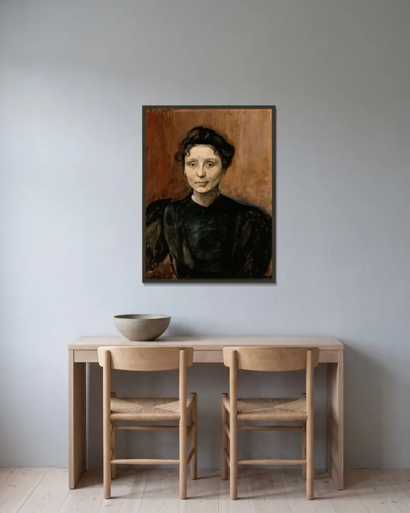 Porträtt av skulptören Madeleine Jouvray av Magnus Enckell inramad på en vägg