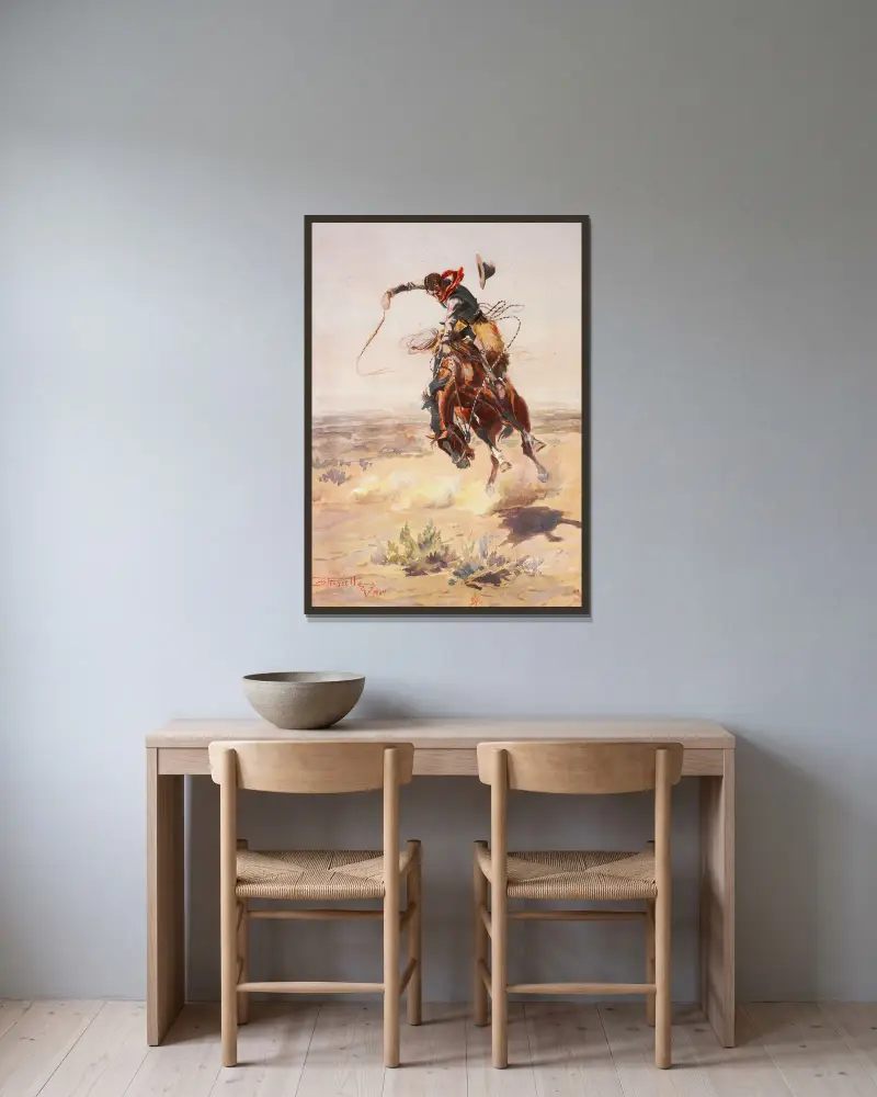 Ein böses Pferd von Charles Marion Russell gerahmt an einer Wand