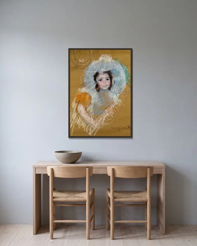 Mädchenbüste von Mary Cassatt gerahmt an einer Wand