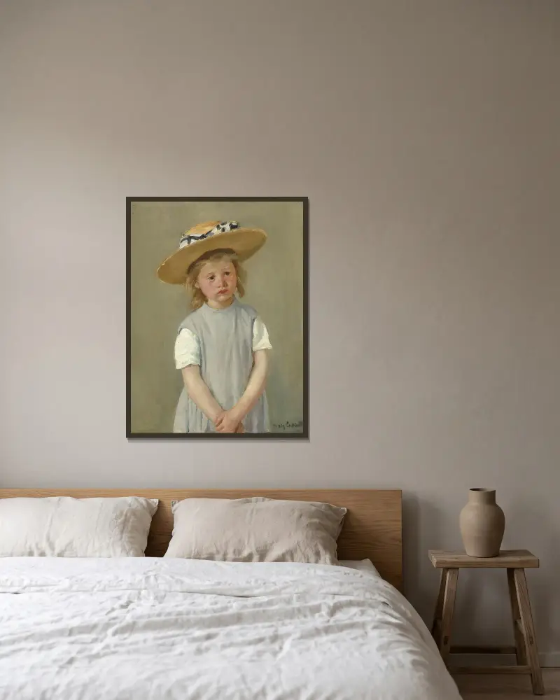 Child in a Straw Hat av Mary Cassatt inramad på en vägg