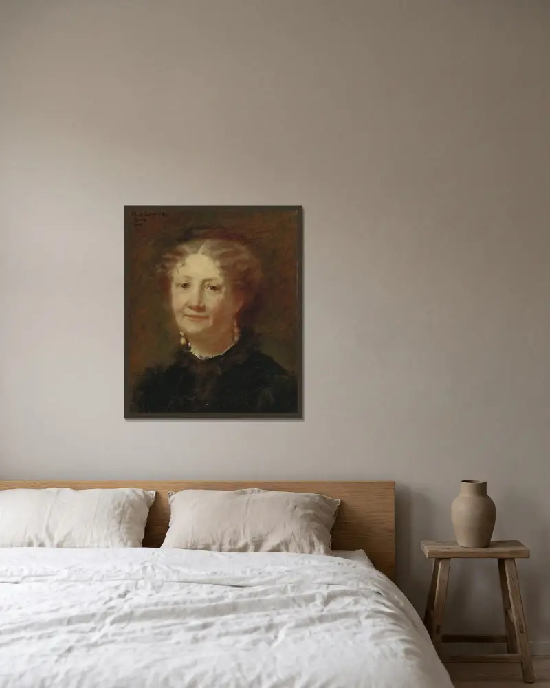 Portrait of Mme Cortier av Mary Cassatt inramad på en vägg