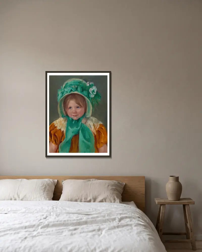 Sara in a Green Bonnet av Mary Cassatt inramad på en vägg