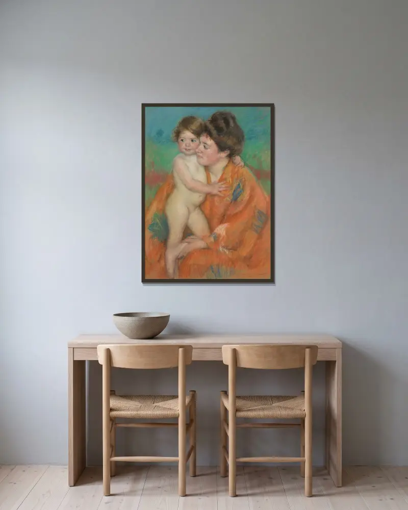 Woman With Baby av Mary Cassatt inramad på en vägg