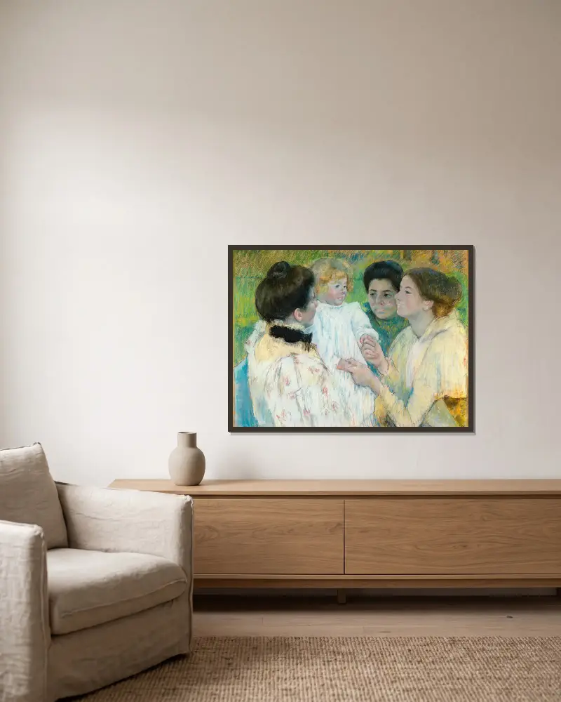 Women Admiring A Child av Mary Cassatt inramad på en vägg